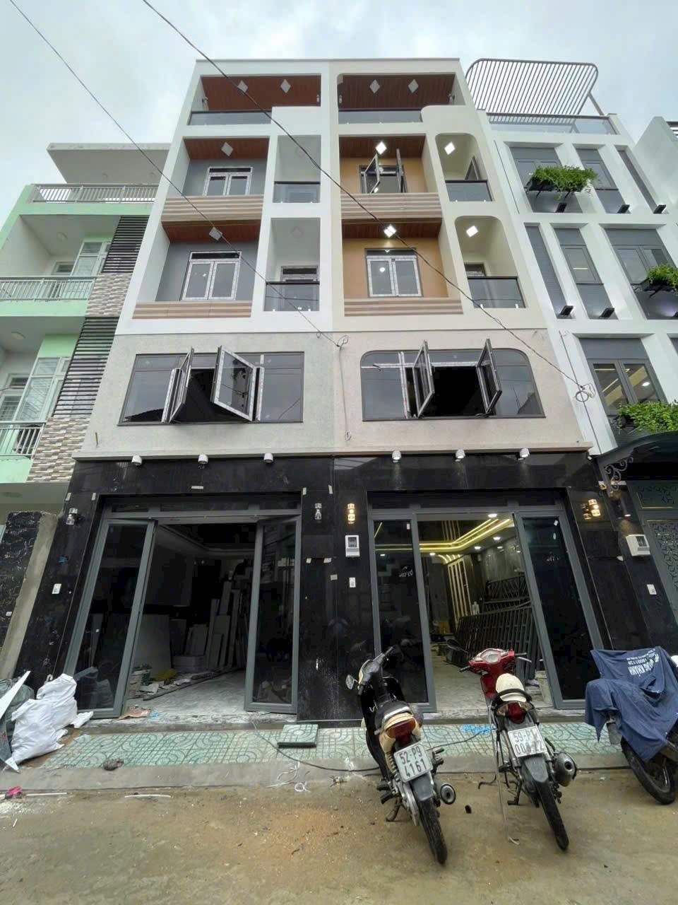 Nhà xây mới sát Q.Tân Phú , DT:4x14 full NT hẻm xe hơi, chỉ 7T9 TL A/c chỉ xách vali ở ngay